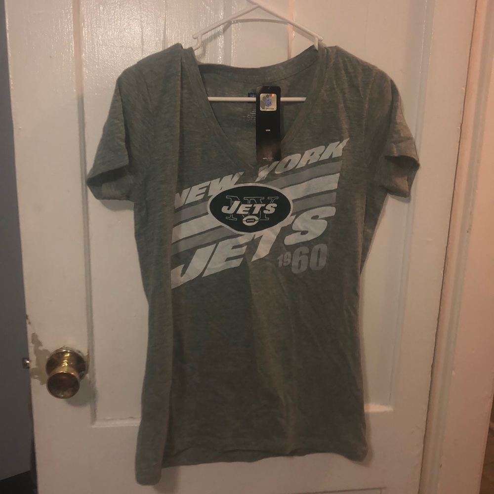 Grayish light green JETS tee